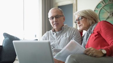 A couple enjoying a scenic view during retirement.